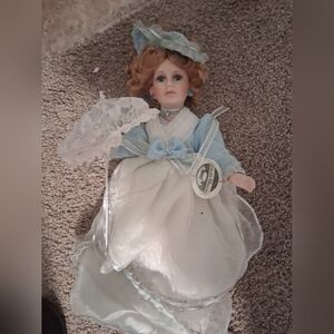 Porcelain Doll with Blue and White Dress